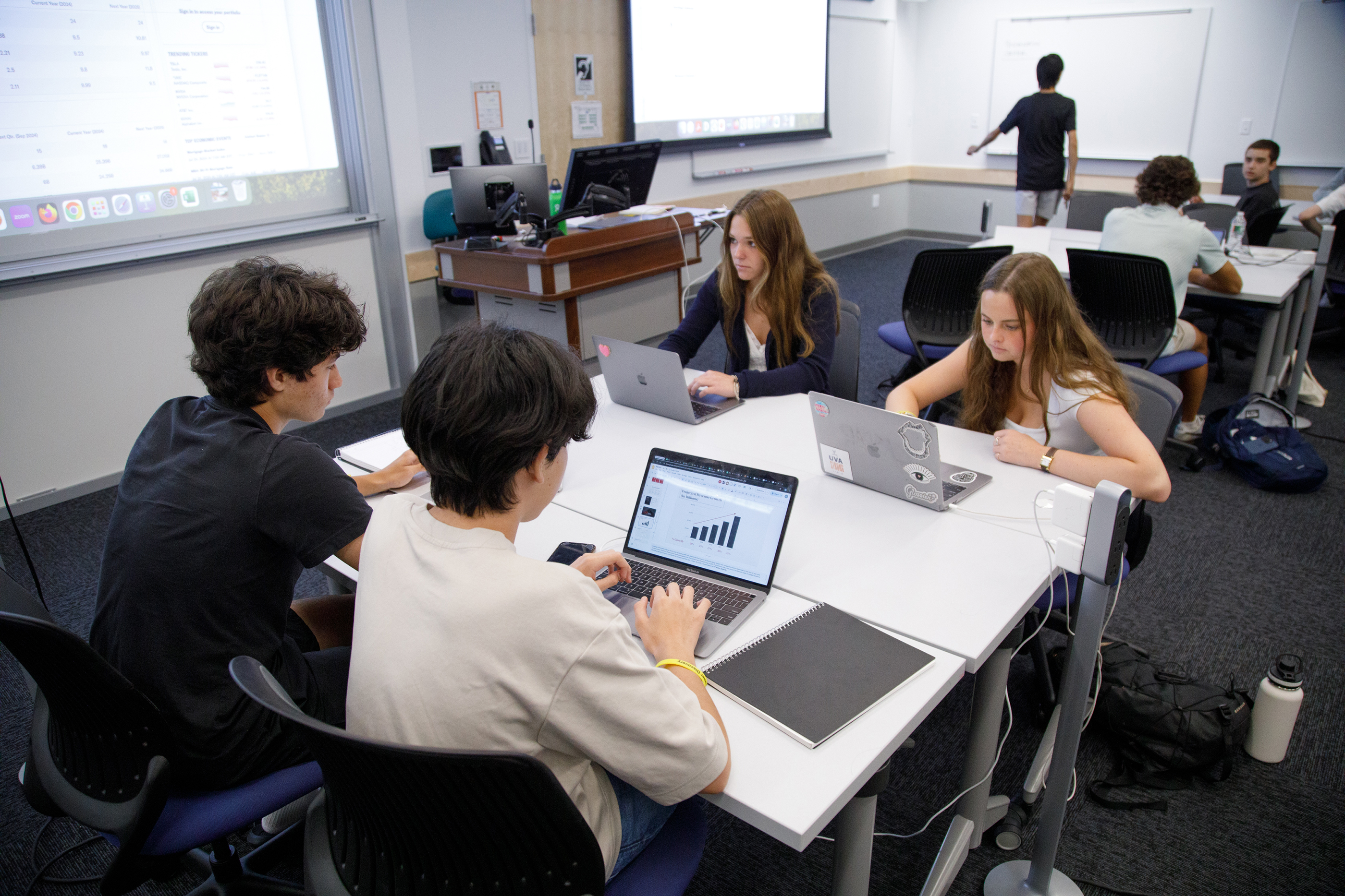 Students work on assignments in a data science course